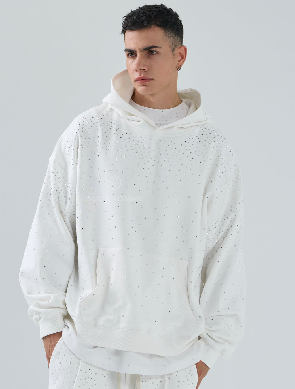 Felpa con brillantini bianca