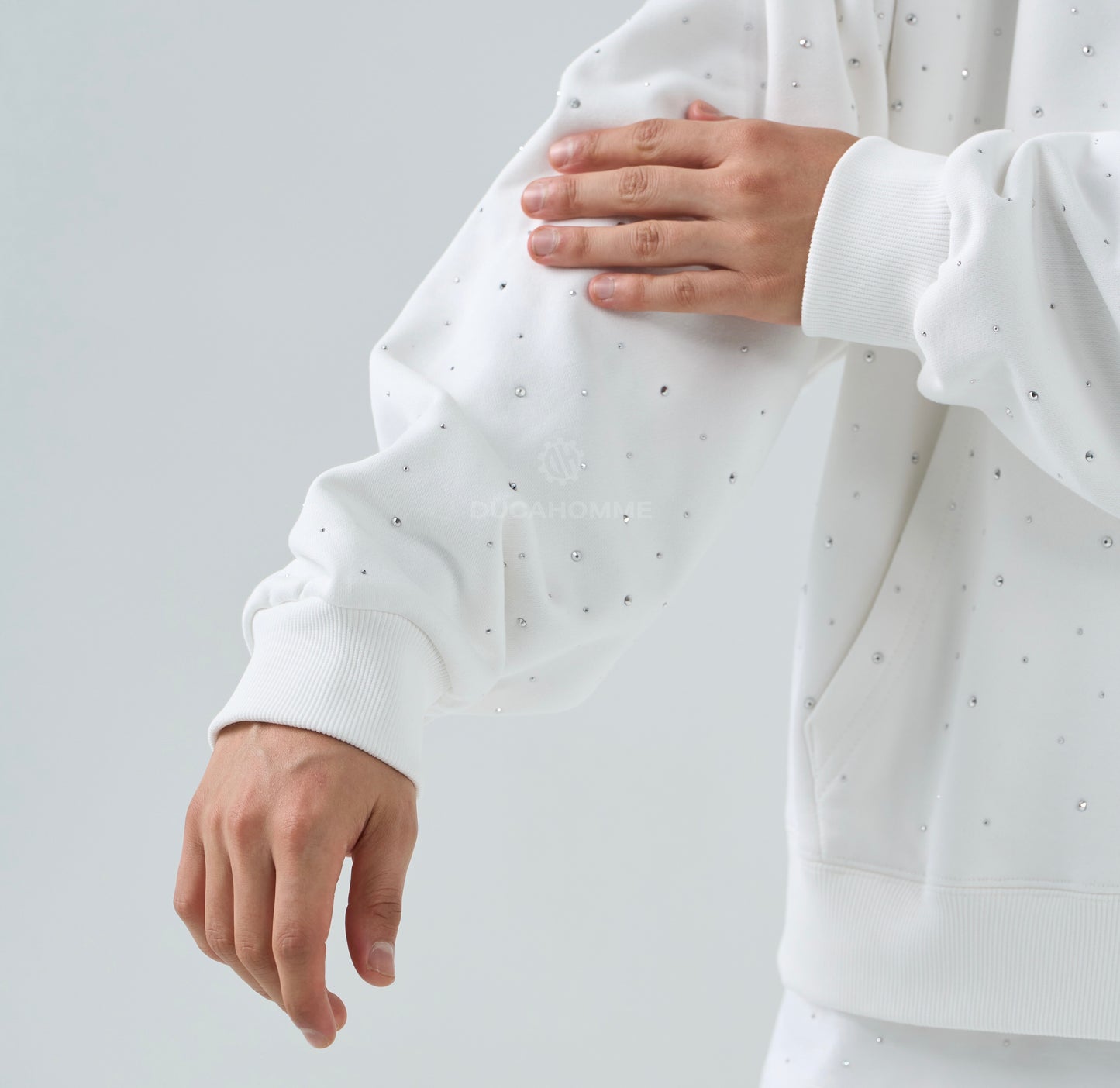 Felpa con brillantini bianca