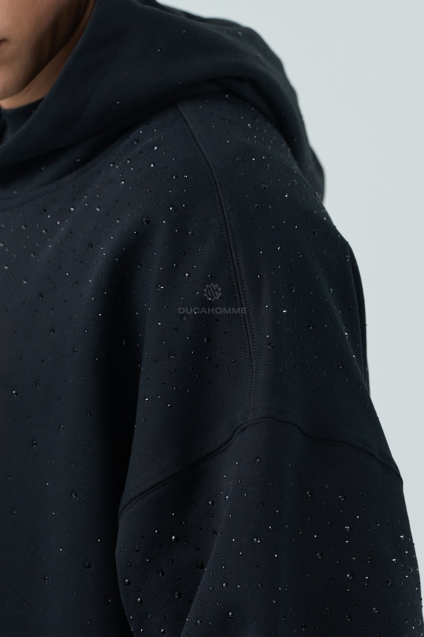 Felpa con brillantini nera