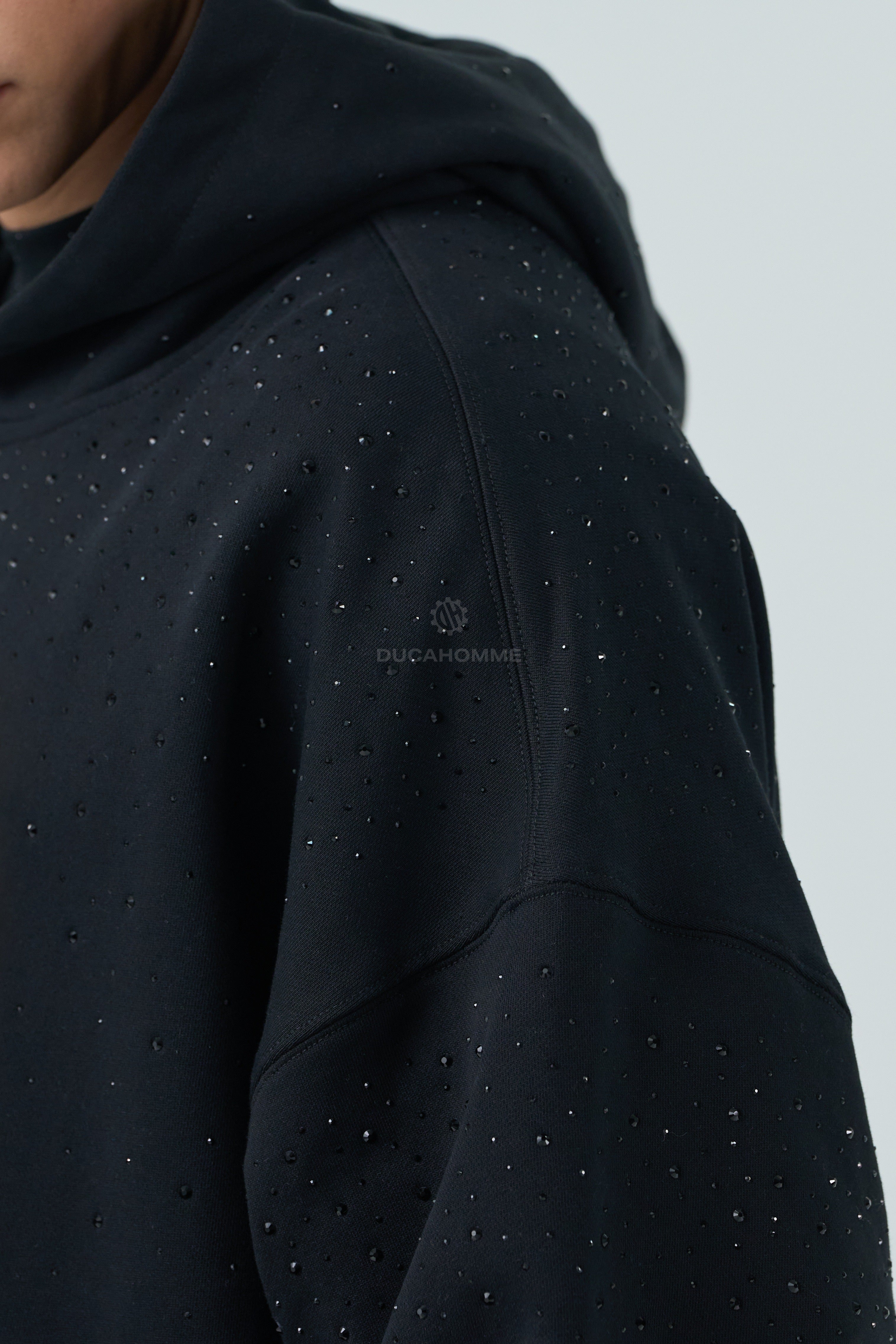 Felpa con brillantini nera